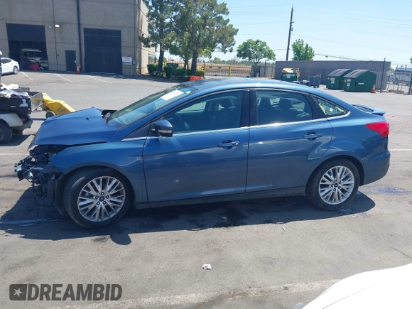 2018 Ford Focus Titanium with VIN 1FADP3J21JL323767, listed as a IAAI auction lot 42375218 with 104,440 mi miles and . Bid and sale history available at DreamBid. Image 14.