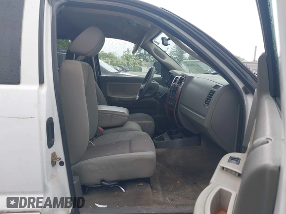 2005 Dodge Dakota SLT with VIN 1D7HW42N75S213191, listed as a IAAI auction lot 42345554 with 152,833 mi miles and . Bid and sale history available at DreamBid. Image 5.