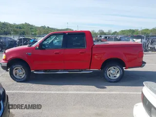 2003 Ford F-150 XLT with VIN 1FTRW08L43KD14456, listed as a IAAI auction lot 42098830 with 234,908 mi miles. Bid and sale history available at carsss.com. Image 15.