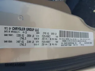 2013 Chrysler Town & Country Touring L with VIN 2C4RC1CG2DR767406, listed as a IAAI auction lot 42067814 with 75,985 mi miles and . Bid and sale history available at DreamBid. Image 9.