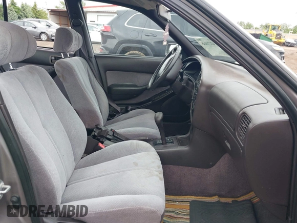 1995 Toyota Camry LE z VIN 4T1SK12E0SU634143, wystawiony jako IAAI lot #42274448 z przebiegiem 159 962 mil mil oraz . Historia ofert i sprzedaży dostępna na DreamBid. Obrazek 5.