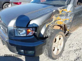 2010 Honda Ridgeline RTL with VIN 5FPYK1F52AB004678, listed as a IAAI auction lot 41661968 with 169,021 mi miles. Bid and sale history available at carsss.com. Image 6.