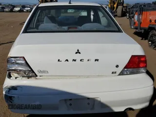 2003 Mitsubishi Lancer ES with VIN JA3AJ26E83U104893, listed as a Copart auction lot 71154944 with 230,061 mi miles and Salvage Title. Bid and sale history available at carsss.com. Image 6.
