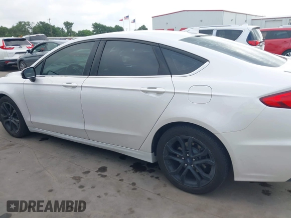 2020 Ford Fusion SE with VIN 3FA6P0HD7LR148007, listed as a IAAI auction lot 42132944 with 63,328 mi miles and . Bid and sale history available at DreamBid. Image 14.