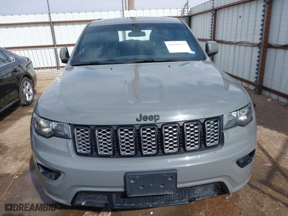 2021 Jeep Grand Cherokee Laredo X with VIN 1C4RJEAG5MC824738, listed as a IAAI auction lot 41580995 with 57,923 mi miles. Bid and sale history available at carsss.com. Image 13.