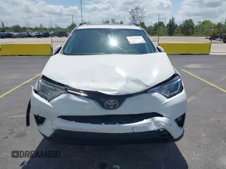 2018 Toyota RAV4 XLE with VIN 2T3WFREV9JW490324, listed as a IAAI auction lot 42298261 with 167,727 mi miles and . Bid and sale history available at DreamBid. Image 6.