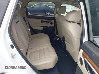 2018 Honda CR-V Touring with VIN 2HKRW2H91JH665241, listed as a IAAI auction lot 42638694 with 62,066 mi miles and . Bid and sale history available at DreamBid. Image 8.