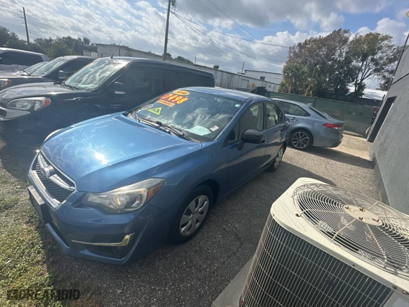 2016 Subaru Impreza Sedan with VIN JF1GJAA64GH004932, listed as a Copart auction lot 87751265 with 99,587 mi miles and Clean Title. Bid and sale history available at carsss.com. Image 2.