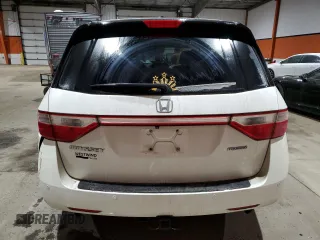 2012 Honda Odyssey Touring with VIN 5FNRL5H94CB508363, listed as a Copart auction lot 42777305 with 158,040 mi miles and Salvage Title. Bid and sale history available at DreamBid. Image 6.