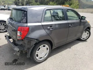 2014 Scion xD with VIN JTKKUPB41E1046114, listed as a Copart auction lot 54599235 with 125,979 mi miles and Salvage title. Bid and sale history available at DreamBid. Image 3.