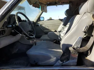 1987 Mercedes-Benz 560 SL with VIN WDBBA48D1HA072141, listed as a Copart auction lot 79715724 with 88,545 mi miles and Salvage Title. Bid and sale history available at DreamBid. Image 7.