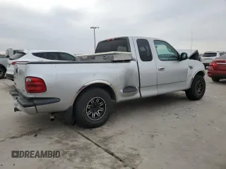 2000 Ford F-150 XL with VIN 1FTRX07L2YKA09673, listed as a Copart auction lot 48177615 with Not provided miles and Salvage title. Bid and sale history available at DreamBid. Image 3.