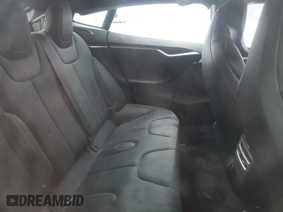 2016 Tesla Model S 90D z VIN 5YJSA1E41GF171522, wystawiony jako Copart lot #59966545 z przebiegiem Nie podano mil oraz Szkoda całkowita • Salvage title. Historia ofert i sprzedaży dostępna na DreamBid. Obrazek 10.