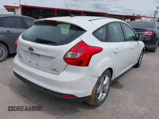2014 Ford Focus SE with VIN 1FADP3K24EL209329, listed as a IAAI auction lot 42223749 with 141,196 mi miles and . Bid and sale history available at carsss.com. Image 4.