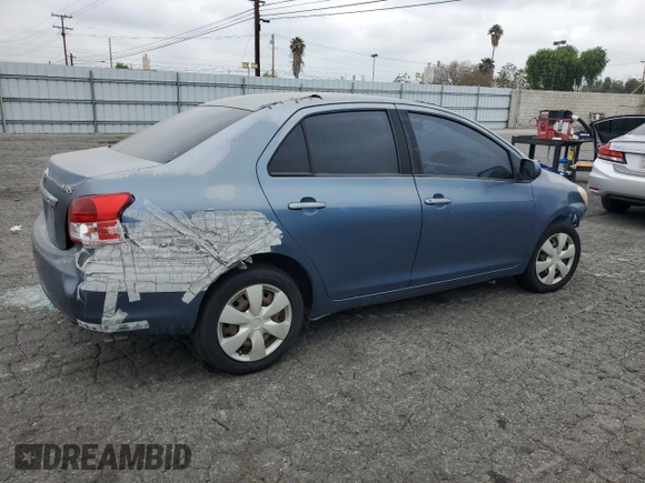 2010 Toyota Yaris with VIN JTDBT4K39A1393586, listed as a Copart auction lot 52240095 with 180,235 mi miles and Clean Title. Bid and sale history available at DreamBid. Image 3.