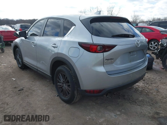 2020 Mazda CX-5 Touring with VIN JM3KFACM5L0768371, listed as a IAAI auction lot 41862623 with 138,446 mi miles and . Bid and sale history available at carsss.com. Image 3.