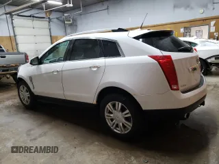 2012 Cadillac SRX Luxury Collection with VIN 3GYFNAE35CS596878, listed as a Copart auction lot 50736725 with 130,007 mi miles and Clean Title. Bid and sale history available at DreamBid. Image 2.