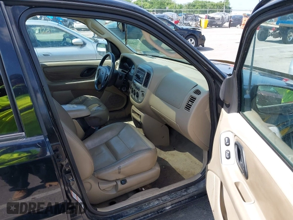 2003 Ford Escape Limited z VIN 1FMCU941X3KB46631, wystawiony jako IAAI lot #42315601 z przebiegiem 202 237 mil mil oraz . Historia ofert i sprzedaży dostępna na DreamBid. Obrazek 5.