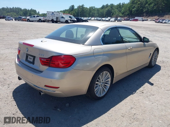 2015 BMW 4 Series 435i xDrive with VIN WBA3T7C51FP942320, listed as a IAAI auction lot 42584318 with 81,814 mi miles and . Bid and sale history available at DreamBid. Image 4.