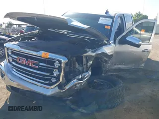 2018 GMC Sierra 1500 SLT with VIN 3GTP1NEC2JG528387, listed as a IAAI auction lot 42598955 with Not provided miles and . Bid and sale history available at DreamBid. Image 6.
