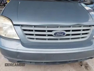 2004 Ford Freestar SES z VIN 2FMZA576X4BA05461, wystawiony jako IAAI lot #42255432 z przebiegiem 115 971 mil mil oraz . Historia ofert i sprzedaży dostępna na DreamBid. Obrazek 6.