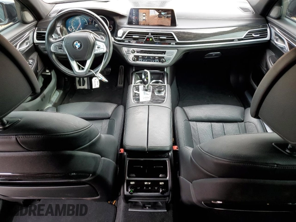 2019 BMW 7 Series 740i с VIN WBA7E2C55KB454929, выставлен на аукционе Copart как лот 49166235 с пробегом 57 051 миль миль и Списание • Salvage title. История ставок и продаж доступна на DreamBid. Изображение 8.