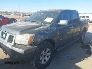 2005 Nissan Titan LE with VIN 1N6AA07B65N501054, listed as a IAAI auction lot 41728466 with 318,859 mi miles. Bid and sale history available at carsss.com. Image 2.