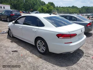 2020 Volkswagen Passat 2.0T S with VIN 1VWAA7A35LC012759, listed as a IAAI auction lot 39909072 with 50,690 mi miles. Bid and sale history available at carsss.com. Image 3.