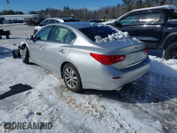 2015 Infiniti Q50 Premium z VIN JN1BV7ARXFM395132, wystawiony jako IAAI lot #41618895 z przebiegiem 96 951 mil mil oraz . Historia ofert i sprzedaży dostępna na DreamBid. Obrazek 3.