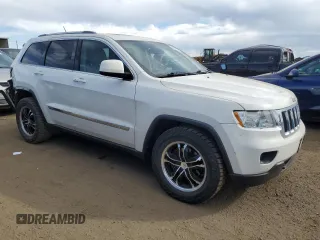 2011 Jeep Grand Cherokee Laredo with VIN 1J4RR4GG8BC718852, listed as a Copart auction lot 49852535 with 101,945 mi miles and Salvage Title. Bid and sale history available at carsss.com. Image 4.