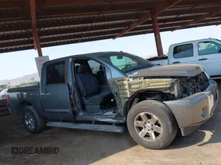 2013 Nissan Titan SL with VIN 1N6AA0ED0DN311415, listed as a IAAI auction lot 42697441 with 150,159 mi miles and . Bid and sale history available at DreamBid. Image 6.