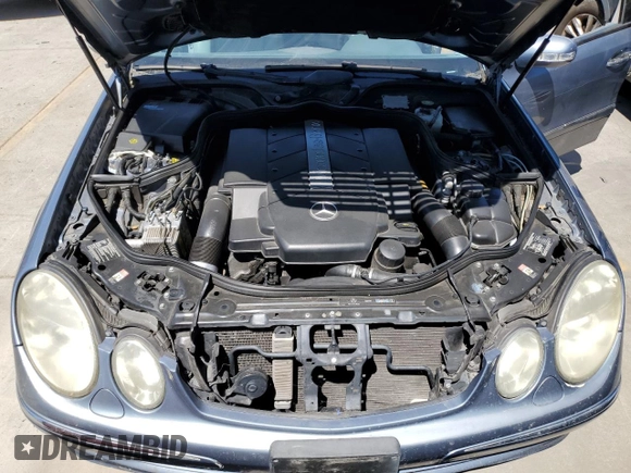 2004 Mercedes-Benz E-Class 5.0L with VIN WDBUF70JX4A479530, listed as a Copart auction lot 68093214 with 165,986 mi miles and Clean Title. Bid and sale history available at carsss.com. Image 11.
