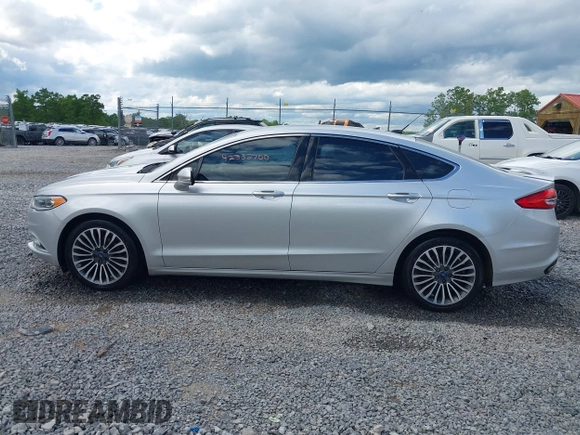 2017 Ford Fusion Titanium with VIN 3FA6P0K99HR112234, listed as a IAAI auction lot 42332700 with 106,685 mi miles and . Bid and sale history available at DreamBid. Image 14.