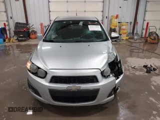 2014 Chevrolet Sonic LT with VIN 1G1JC5SG8E4107664, listed as a IAAI auction lot 41614306 with 128,946 mi miles and . Bid and sale history available at DreamBid. Image 12.