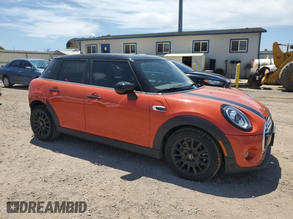 2020 MINI Hardtop 4 Door Cooper with VIN WMWXU7C01L2L63159, listed as a Copart auction lot 51349325 with 16,905 mi miles and Salvage title. Bid and sale history available at DreamBid. Image 4.
