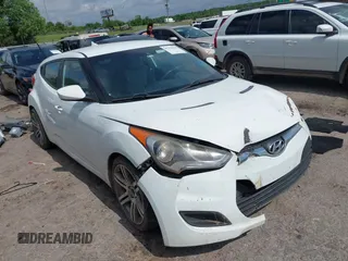 2013 Hyundai Veloster w/Black Int with VIN KMHTC6AD4DU142810, listed as a IAAI auction lot 42358792 with 203,029 mi miles and . Bid and sale history available at DreamBid. Image 1.