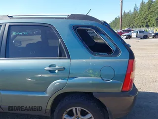 2006 Kia Sportage LX with VIN KNDJE723667170725, listed as a IAAI auction lot 42347100 with 153,002 mi miles and . Bid and sale history available at DreamBid. Image 6.