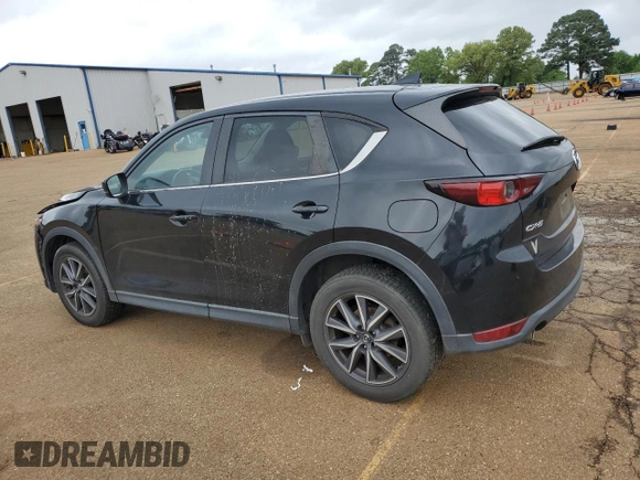 2018 Mazda CX-5 Touring with VIN JM3KFACM4J1326270, listed as a Copart auction lot 51731985 with 87,129 mi miles and Salvage Title. Bid and sale history available at carsss.com. Image 2.