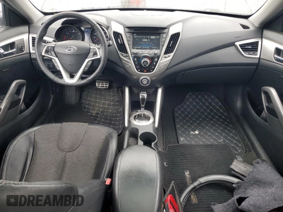 2012 Hyundai Veloster w/Gray Int z VIN KMHTC6AD9CU079542, wystawiony jako Copart lot #55998045 z przebiegiem 98 065 mil mil oraz Szkoda całkowita • Salvage title. Historia ofert i sprzedaży dostępna na DreamBid. Obrazek 8.