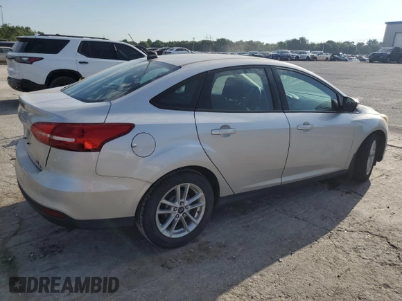 2015 Ford Focus SE with VIN 1FADP3F28FL234097, listed as a Copart auction lot 62660245 with 120,100 mi miles and Salvage title. Bid and sale history available at DreamBid. Image 3.