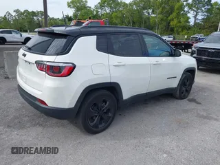 2018 Jeep Compass Latitude with VIN 3C4NJCBB1JT408465, listed as a IAAI auction lot 41350902 with 79,565 mi miles and . Bid and sale history available at DreamBid. Image 4.