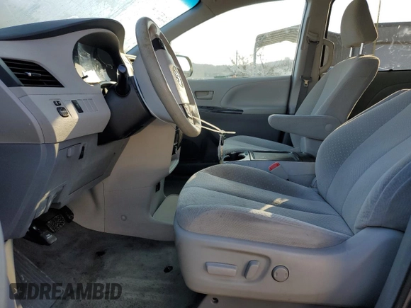 2014 Toyota Sienna LE AAS with VIN 5TDKK3DC8ES517561, listed as a Copart auction lot 86393114 with 212,231 mi miles and Clean Title. Bid and sale history available at DreamBid. Image 7.