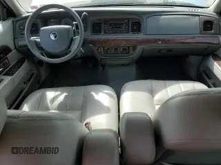 2005 Mercury Grand Marquis GS z VIN 2MEFM74W75X603444, wystawiony jako Copart lot #54395945 z przebiegiem 110 933 mil mil oraz Czysty tytuł • Clean title. Historia ofert i sprzedaży dostępna na DreamBid. Obrazek 8.