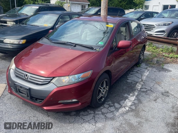 2010 Honda Insight LX с VIN JHMZE2H59AS032860, выставлен на аукционе Copart как лот 64378915 с пробегом 253 555 миль миль и Чистый • Clean title. История ставок и продаж доступна на DreamBid. Изображение 2.