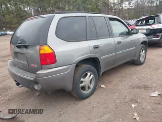 2008 GMC Envoy SLE1 with VIN 1GKDS13S682205759, listed as a IAAI auction lot 41378668 with 234,582 mi miles and . Bid and sale history available at DreamBid. Image 4.