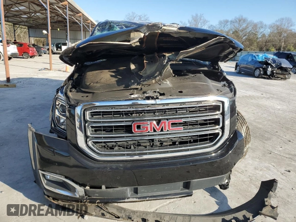2019 GMC Yukon SLE with VIN 1GKS1AKC6KR302642, listed as a Copart auction lot 41510715 with 97,906 mi miles and Salvage Title. Bid and sale history available at carsss.com. Image 5.