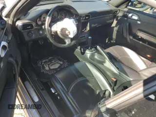 2008 Porsche 911 Carrera S z VIN WP0CB29998S776812, wystawiony jako Copart lot #86967074 z przebiegiem Nie podano mil oraz Szkoda całkowita • Salvage title. Historia ofert i sprzedaży dostępna na DreamBid. Obrazek 8.
