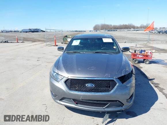 2013 Ford Taurus SHO с VIN 1FAHP2KT0DG220825, выставлен на аукционе IAAI как лот 41851095 с пробегом 163 797 миль миль и . История ставок и продаж доступна на DreamBid. Изображение 13.