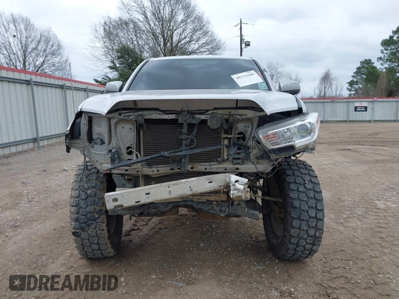 2017 Toyota Tacoma SR z VIN 5TFAX5GN0HX083950, wystawiony jako IAAI lot #41519388 z przebiegiem 130 211 mil mil oraz . Historia ofert i sprzedaży dostępna na DreamBid. Obrazek 13.
