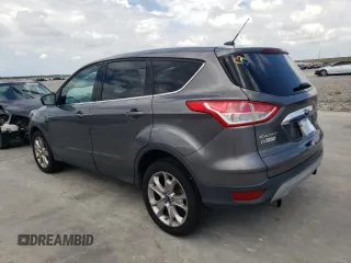 2013 Ford Escape SEL with VIN 1FMCU9H91DUA78791, listed as a Copart auction lot 61853684 with 145,105 mi miles and Clean title. Bid and sale history available at DreamBid. Image 2.